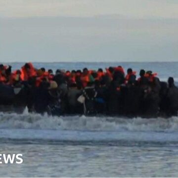 Watch: BBC crew captures moment migrants board small crowded boat to UK from France