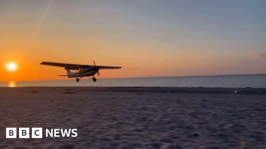 The moment pilot makes emergency landing on US beach