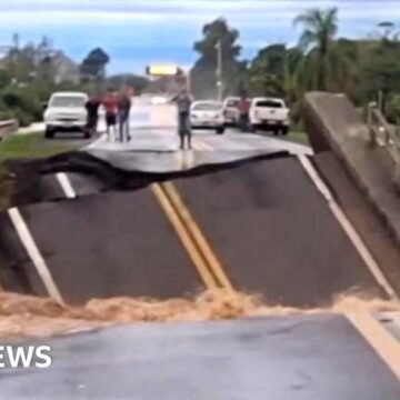 Brazil bridge buckles and plunges into river