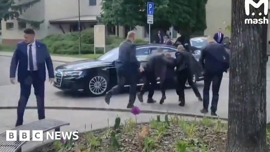 Slovak PM Robert Fico carried to car after being shot