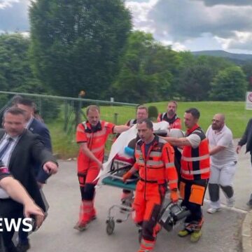 Slovak PM Robert Fico wheeled into hospital on stretcher