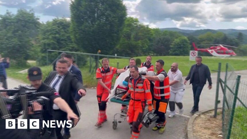 Slovak PM Robert Fico wheeled into hospital on stretcher