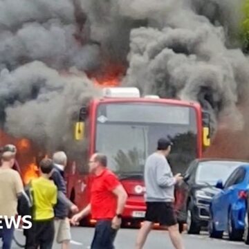 Smoke fills street as London bus catches fire in Twickenham