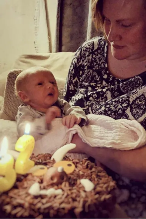 Family picture Woman holds newborn baby