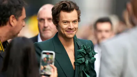 Getty Images British singer-actor Harry Styles arrives for the premiere of My Policeman during the Toronto International Film Festival in Toronto, Ontario, Canada, on September 11, 2022