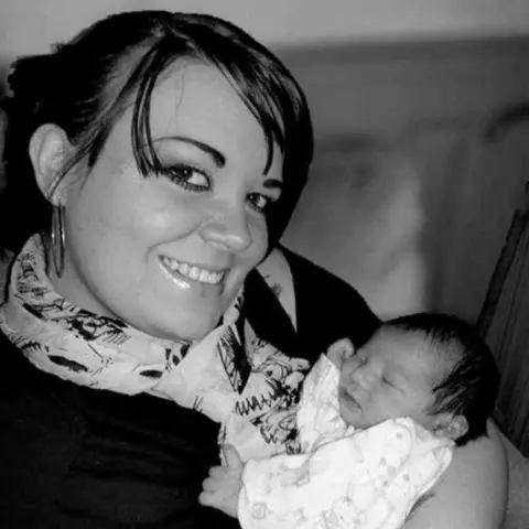 Kayleigh Coclough Ms Coclough holding Shay as a baby