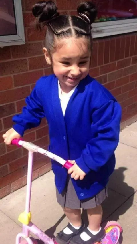 Kayleigh Coclough A young Shay on a scooter