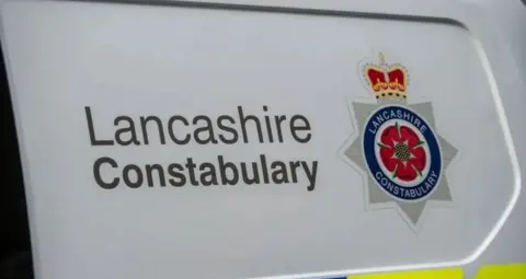 James Malone Lancashire Police badge