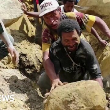 Locals scramble to search deadly landslide by hand