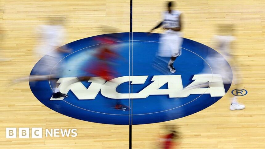 NCAA votes to approve payments to student athletes