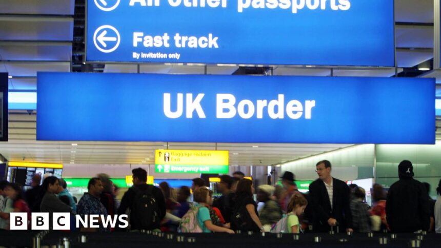 Net migration to UK fell 10% last year, ONS figures show