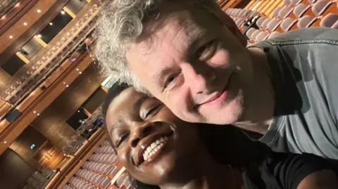 Sara Otiung Dr Otung with Michael Sheen 