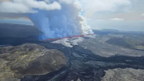 Almannavarnadeild/Anadolu/Getty Images volcanic eruption is seen from a helicopter flight Landhelgisgasla Islands for the fifth time since December on the Reykjanes peninsula in southwestern Iceland on May 29, 2024. 