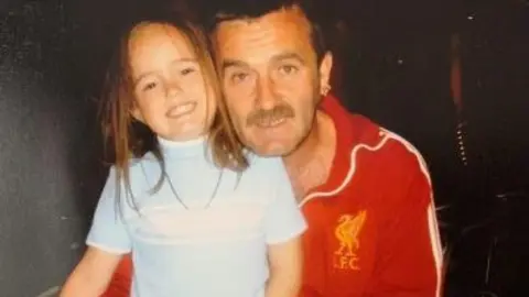 Ellie Harris A young Ellie Harris with her dad 