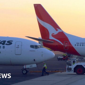 Qantas agrees payouts over 'ghost flights'