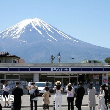 Japan blocks iconic Mt Fuji view to deter tourists