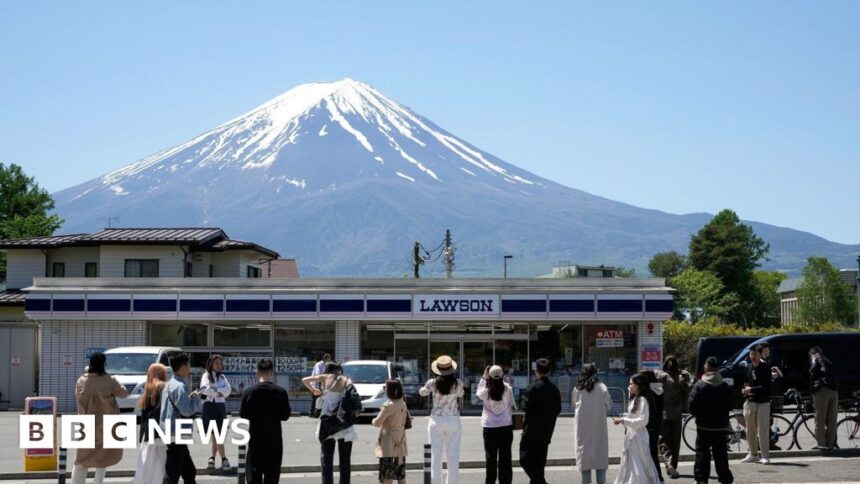 Japan blocks iconic Mt Fuji view to deter tourists