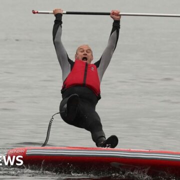 Ed Davey takes a dip in Lake Windermere