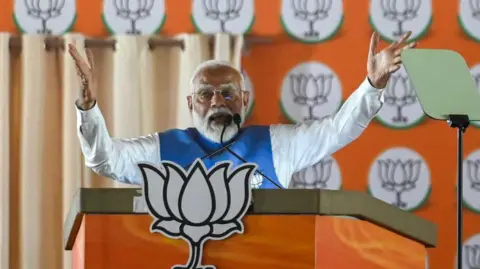 Getty Images NEW DELHI, INDIA - MAY 22: Prime Minister Narendra Modi during an election rally in Dwarka for the BJP Lok Sabha candidates, on May 22, 2024 in New Delhi